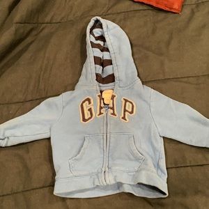 Baby Gap light blue zip up hoodie. 12-18 months